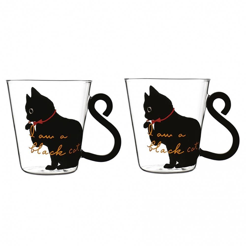 Two glass mugs with black cat illustrations and 'I am a black cat' text  