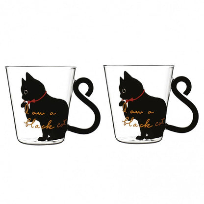 Two glass mugs with black cat illustrations and 'I am a black cat' text  