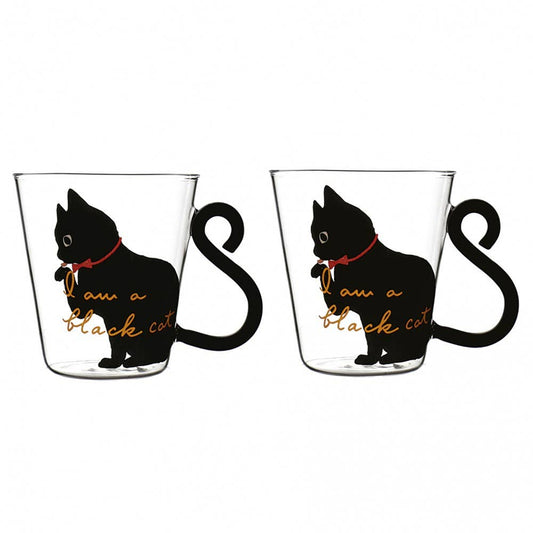 Two glass mugs with black cat illustrations and 'I am a black cat' text  