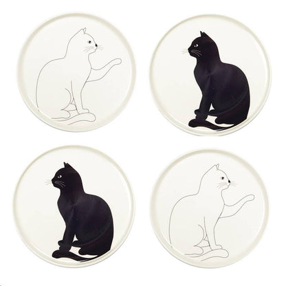 Four plates with black and white cat silhouettes on a white background