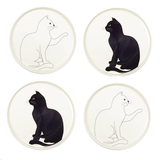 Four plates with black and white cat silhouettes on a white background