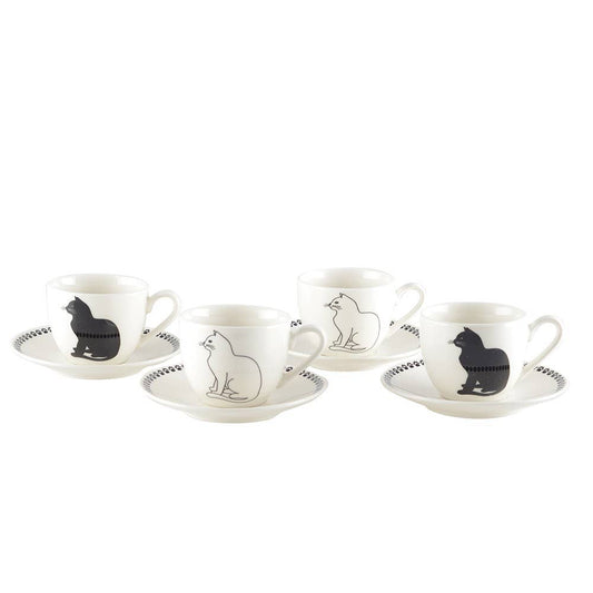 Set of four white tea cups  and saucers with black and white cat illustrations  on a white background

