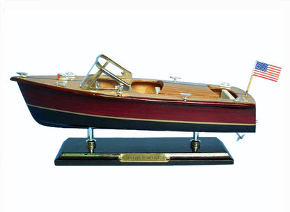 Chris Craft Model boat with an American flag  