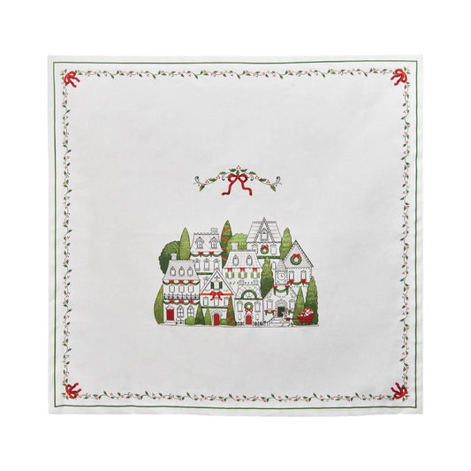 Cloth napkins with a festive village design and border on a white background.