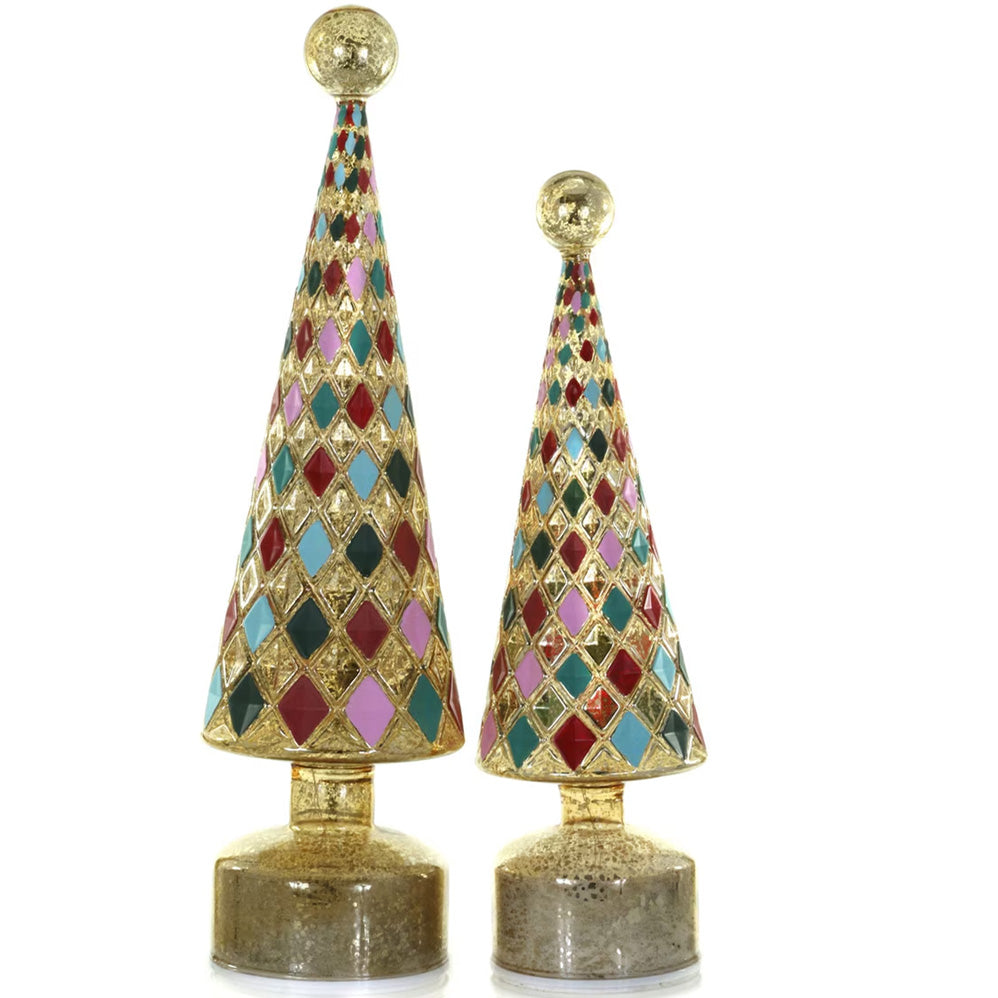 Two decorative tabletop Christmas trees  with gold-tone bases and conical tops, covered in a multicolor harlequin diamond pattern of red, blue, green, and pink tiles.