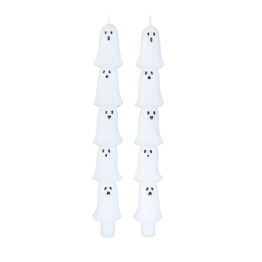 Set of taper candles of ghosts stacked on one another