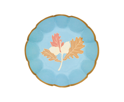 Round paper bowls with leaf design on a blue background