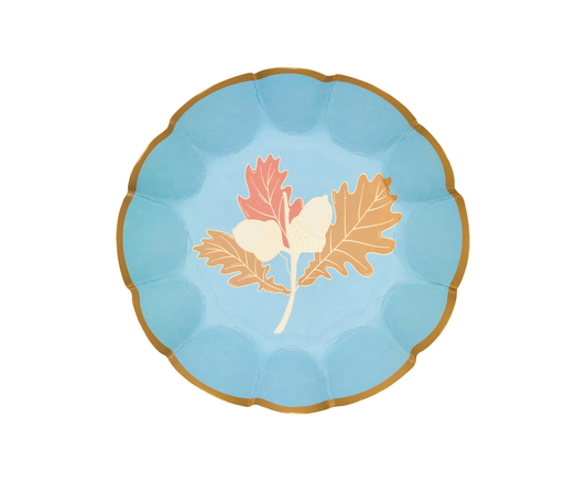 Round paper bowls with leaf design on a blue background