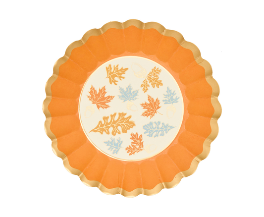 Round paper plates with leaf design and scalloped edge 
