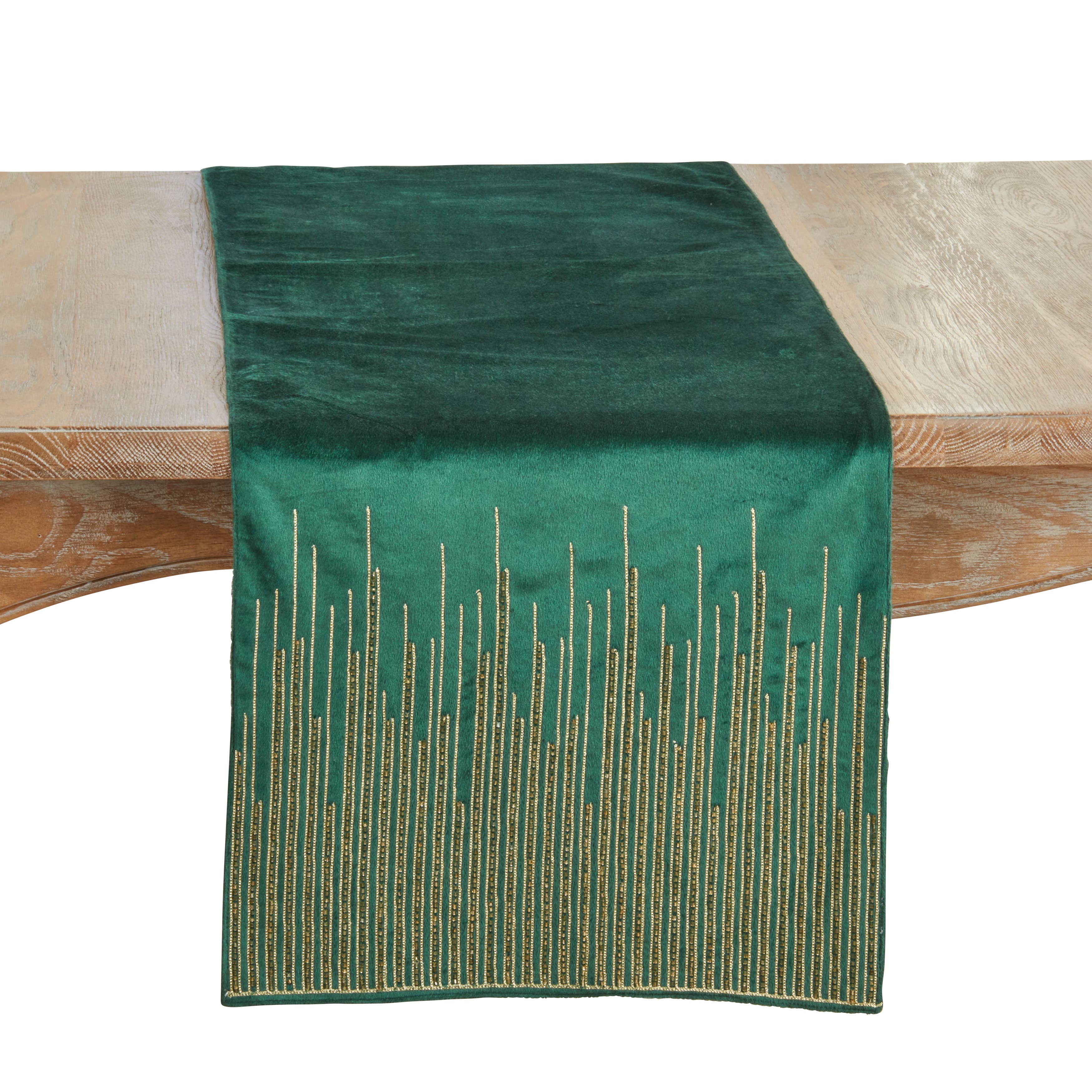 Green velvet table runner with gold beaded lines