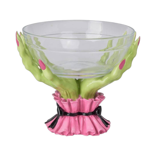 Decorative candy  bowl held by green witch hands with pink nails  