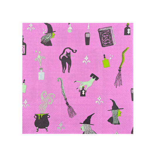 Purple paper dinner napkins with Halloween-themed designs including witches, cats, brooms, and potion bottles.