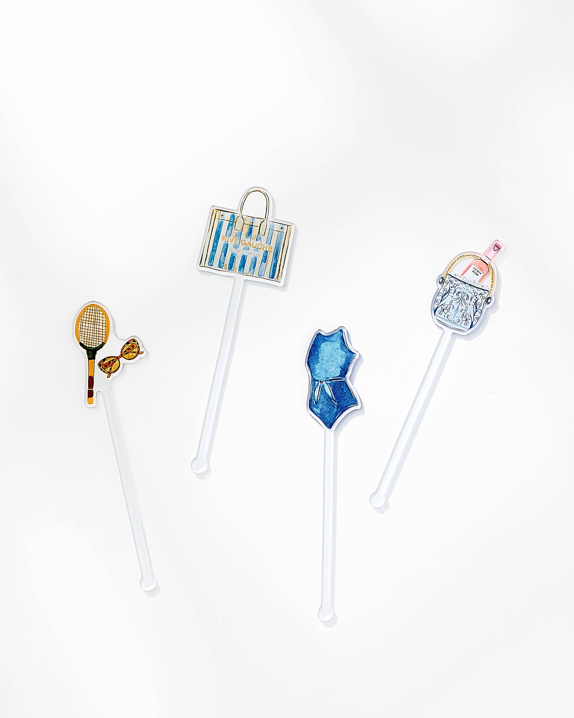Set of four decorative straws with various beach theme design 