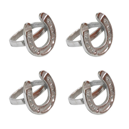 Four silver rings with horseshoe design .