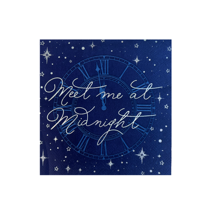 Paper napkins with clock design and 'Meet me at Midnight' text on a blue background