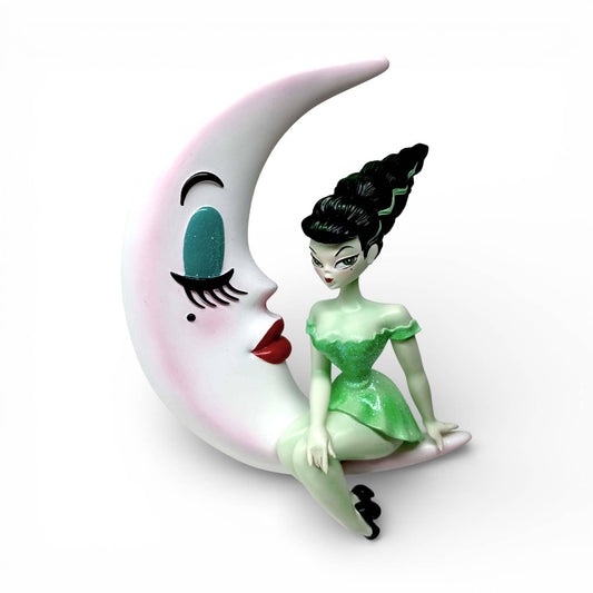 Bride of Frankie ornament sitting on a crescent moon with a face