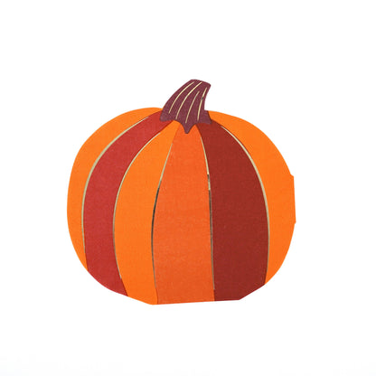 Orange paper napkins made to resemble pumpkins and accented with gold foil 