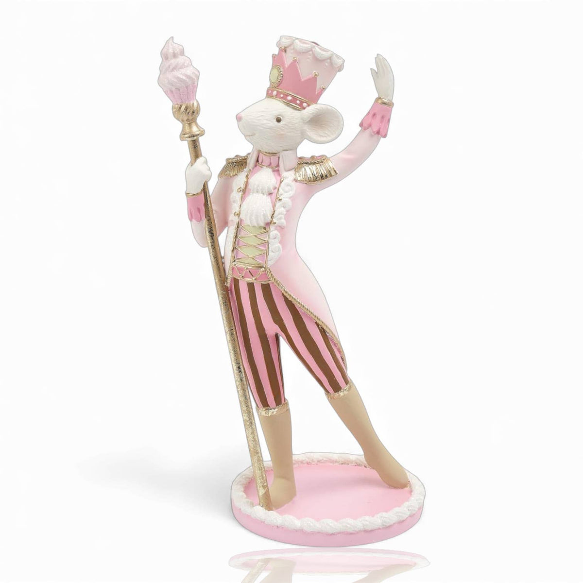 Mouse figurine in a pink and gold outfit with a crown, holding a staff .