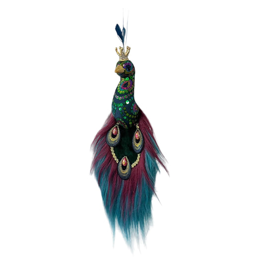 Decorative sequined peacock ornament with a crown and feathers. 