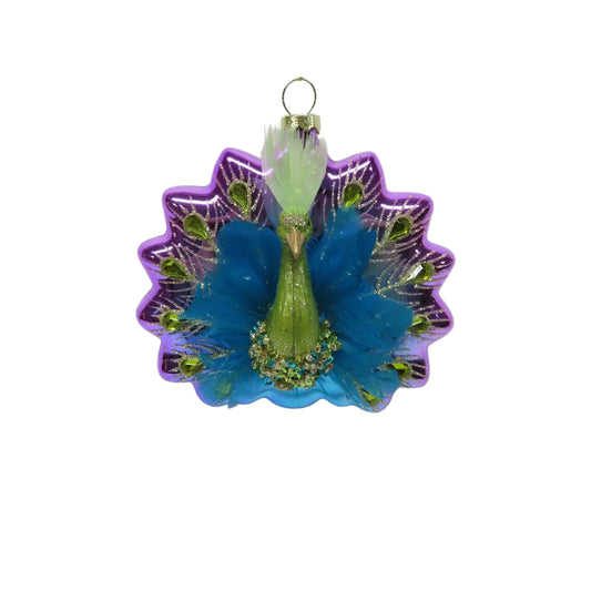 Decorative blue and green ornament made to resemble a peacock.