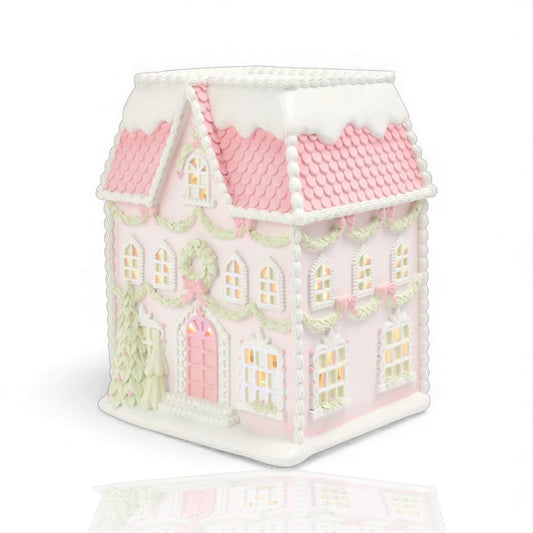 Tabletop pink and mint green 12" gingerbread house with LED lighting. 