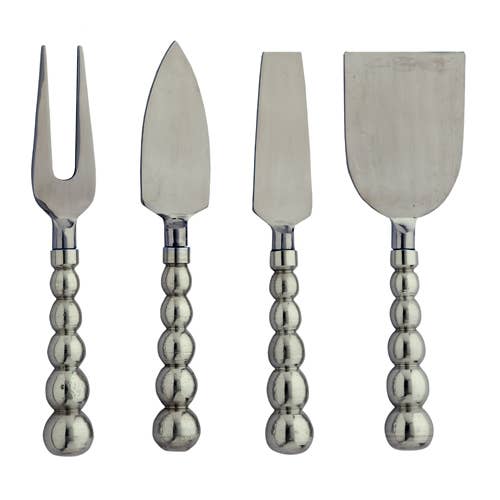 Set of four silver cheese tools with decorative handles  