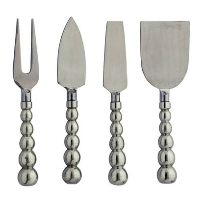 Set of four silver cheese tools with decorative handles  