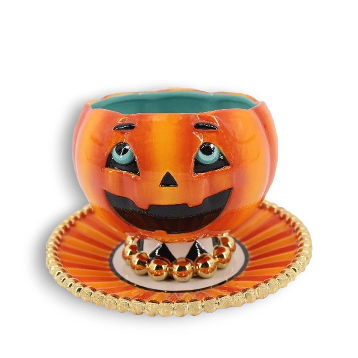 Ceramic pumpkin with face design with a match plate. 