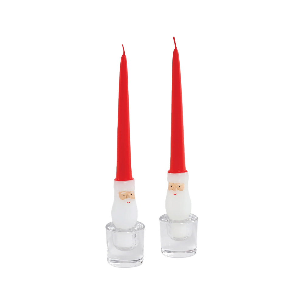 Two Santa Claus theme taper candles  with red hats and white bodies.