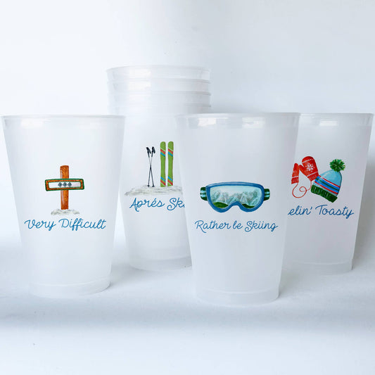 Package of eight frosted plastic cups with four different skiing-themed designs  