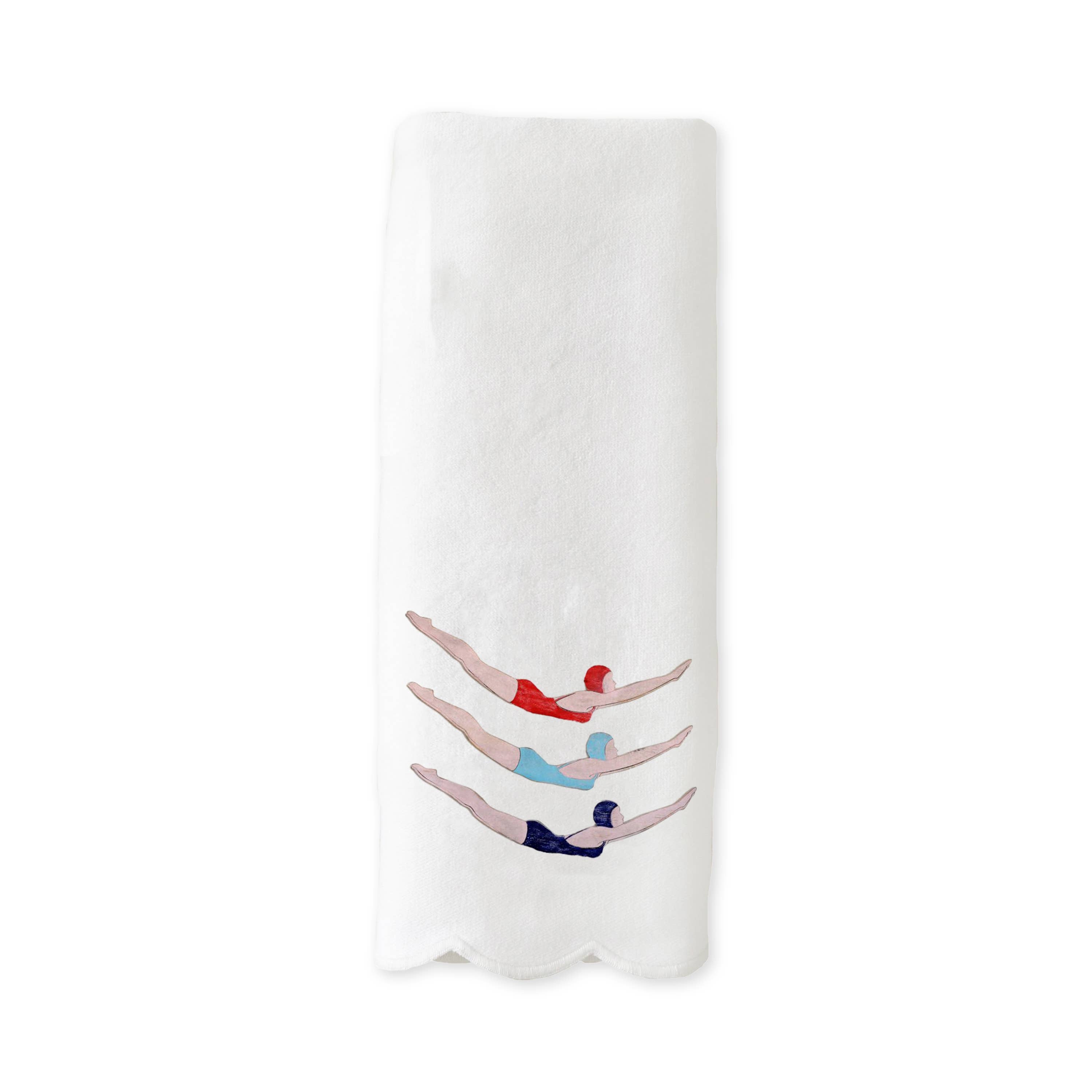 White towel with scalloped borders with  with swimmer design 