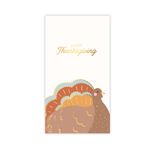 Paper guest towels with a turkey illustration and 'Happy Thanksgiving' text on a white background
