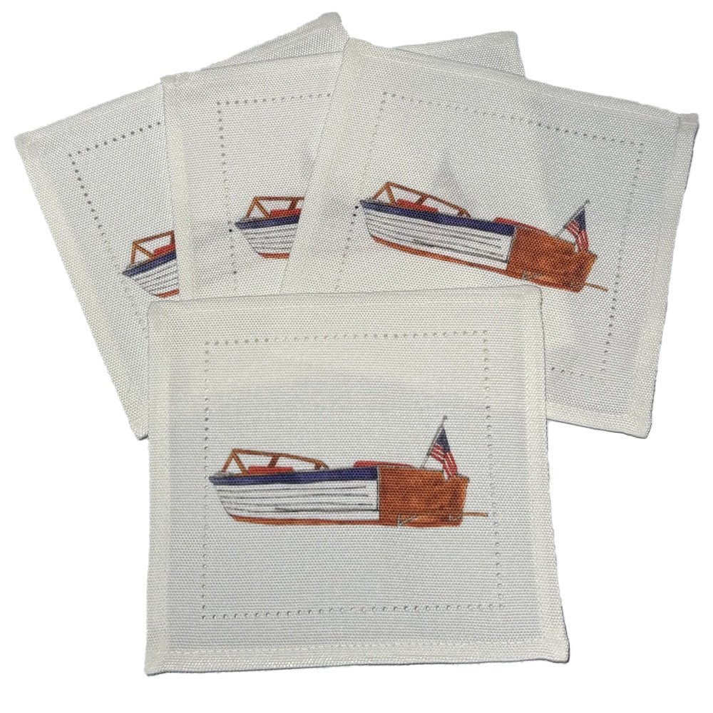 Set of four fabric cocktail napkins with an image of a vintage classic boat design on a white background