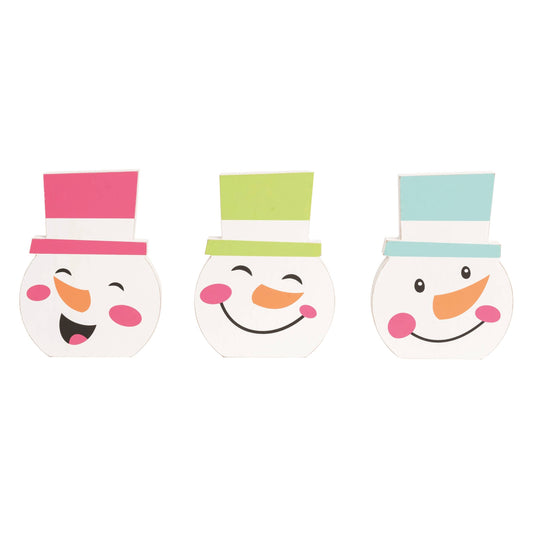 Three snowman-shaped tabletop figures with colorful hats 